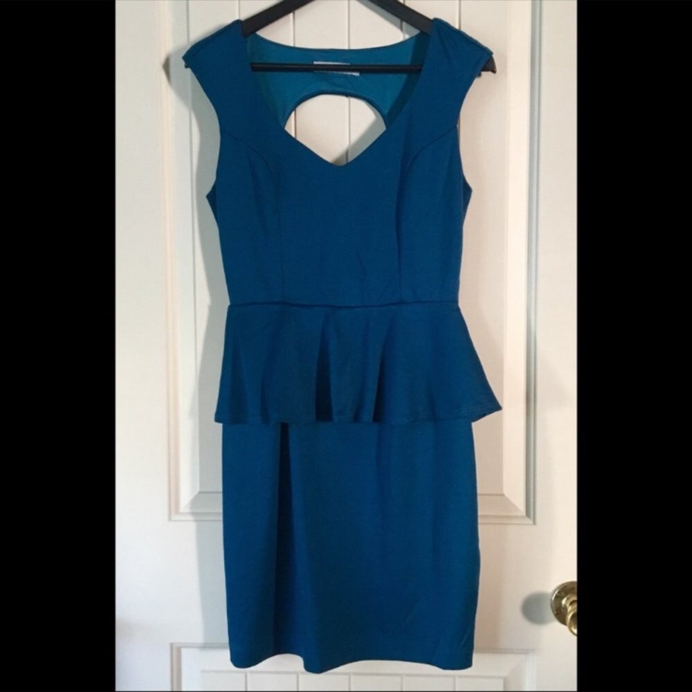 • Off brand peplum dress with cut out backside